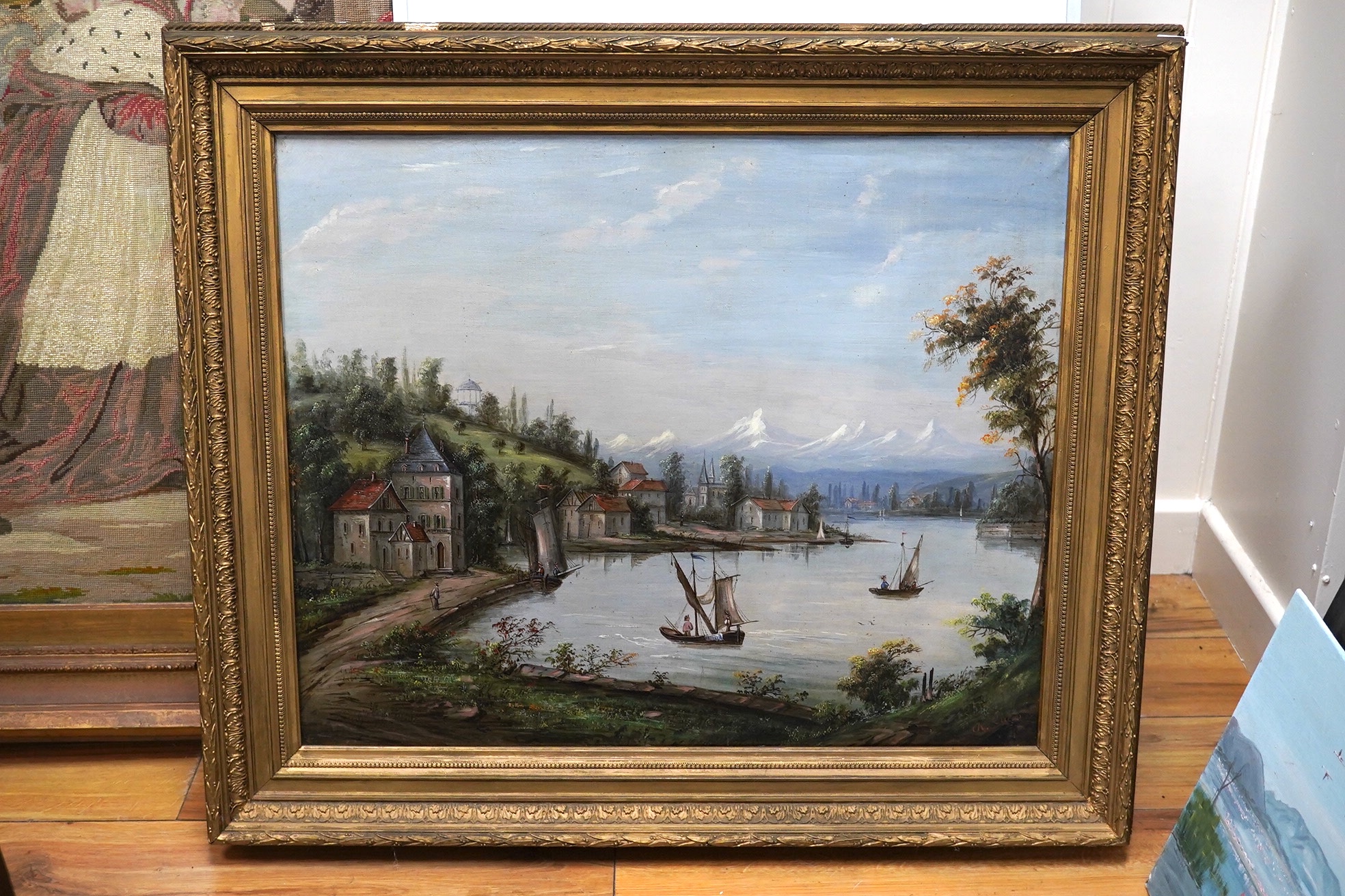 De Lucas?, oil on canvas, Swiss lakeside landscape with chalets, signed, 57 x 70cm, ornate gilt frame. Condition - good